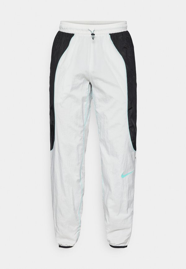 Nike Performance Tracksuit bottoms - photon dust/black/dynamic turq