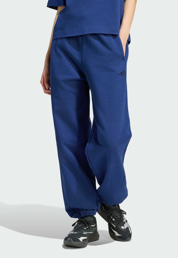 adidas Sportswear ADIDAS SPORTSWEAR ADIDAS KIT SMALL LOGO LOOSE CUFFED PANTS - Tracksuit bottoms - dark blue