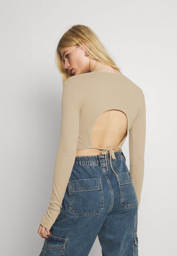 NU-IN CUTOUT TIE BACK