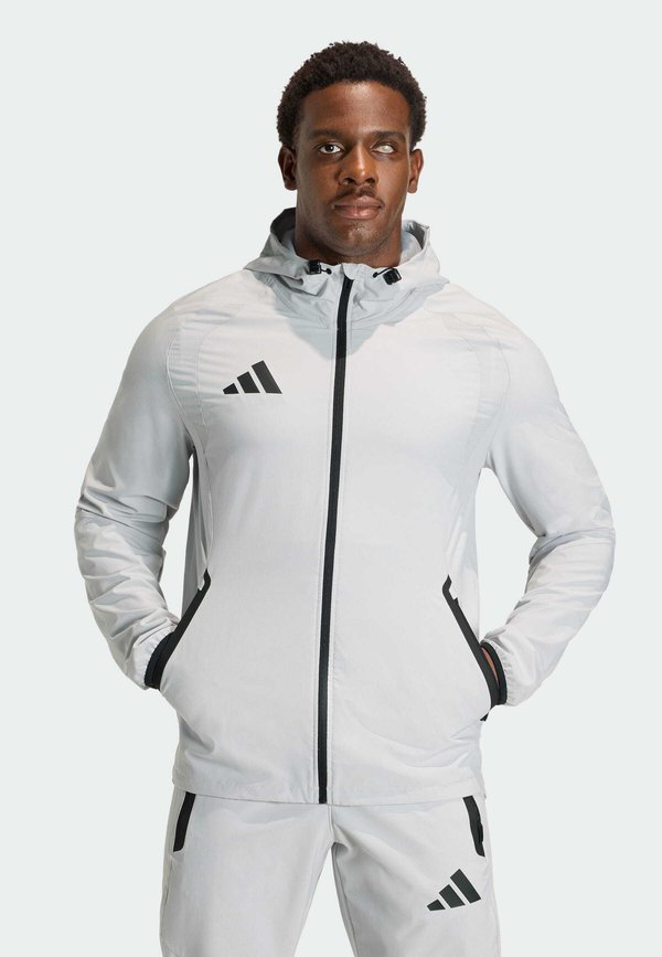 adidas Performance TIRO TRAVEL  - Windbreaker - team light grey   black