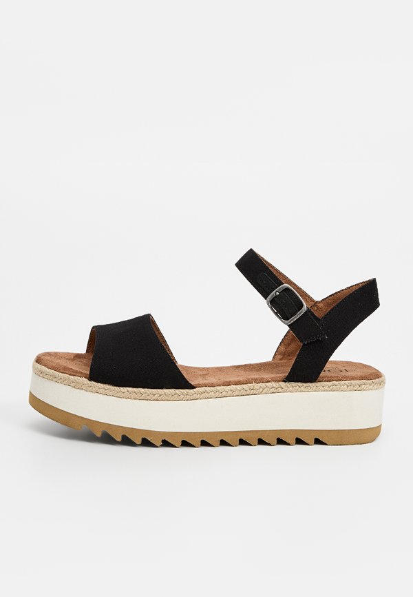 TOMS NAIA