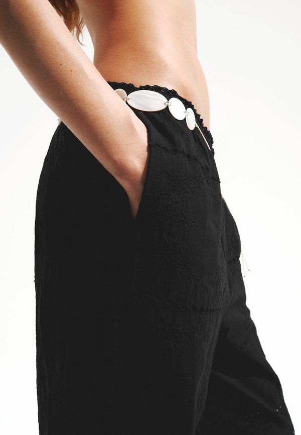 Mango ADULT - Trousers - black