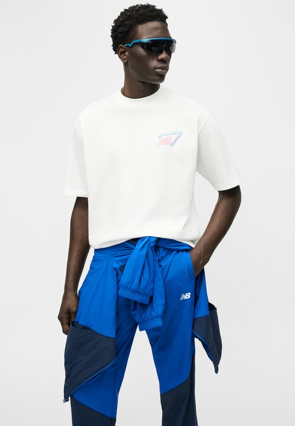 New Balance SPORT LEGACY PANT