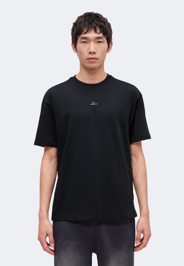 Nike Performance STANDART ISSUE TEE - Sports T-shirt - black/pale ivory