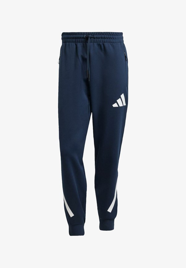 adidas Sportswear ADIDAS Z.N.E. - Tracksuit bottoms - aurora ink