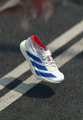 adidas Performance ADIZERO ADIOS PRO 4 - Road running shoes - footwear white/team royal blue/pure ruby