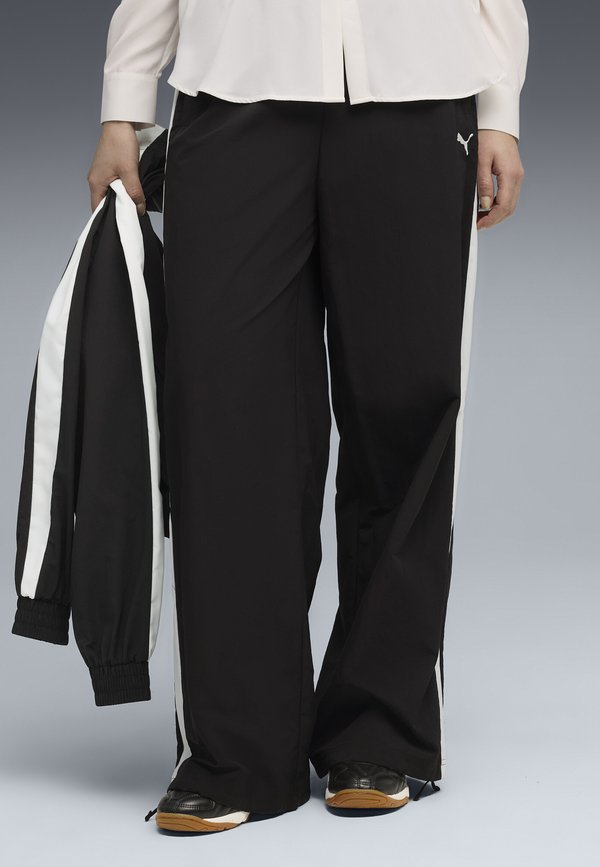 Puma RELAXED TRACK - Tracksuit bottoms - black