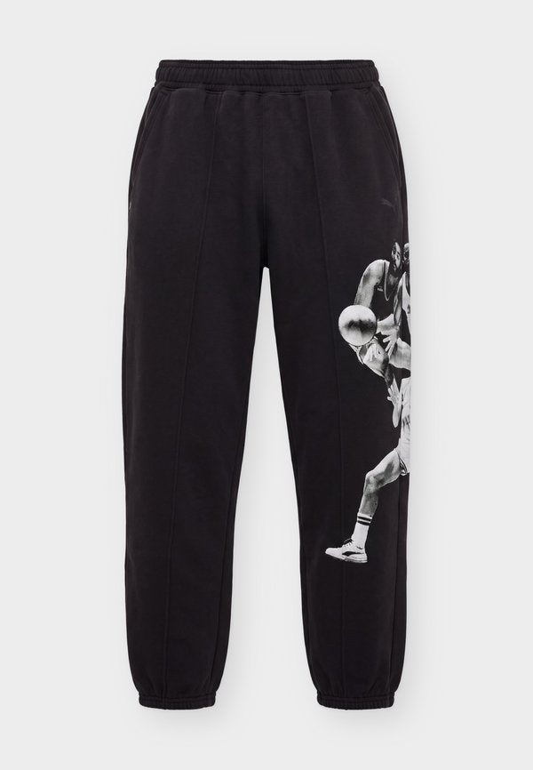 Puma MEMORY LANE - Tracksuit bottoms - black