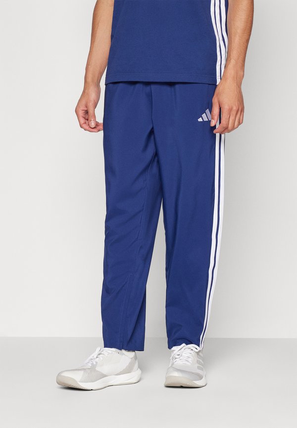 adidas Sportswear M STNFRD OPT 3S - Tracksuit bottoms - dark blue   white