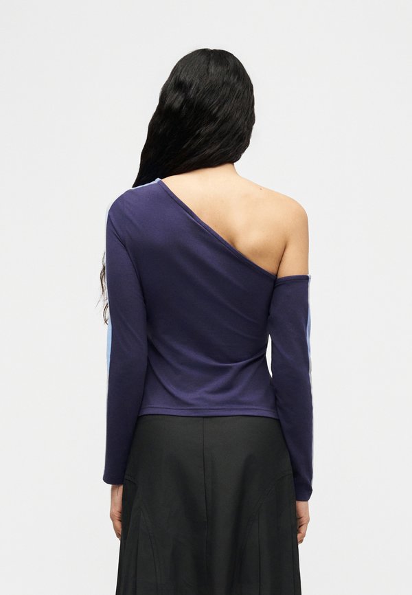Puma ASYMMETRIC
