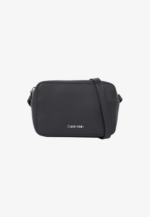 Calvin Klein MUST CAMERA BAG - Cross body bag - black