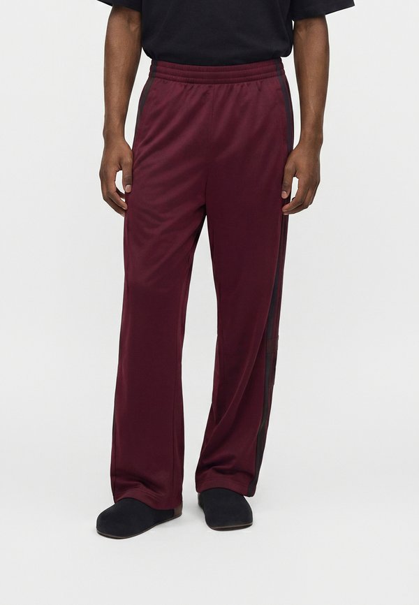 adidas Originals ADIBREAK - Tracksuit bottoms - maroon
