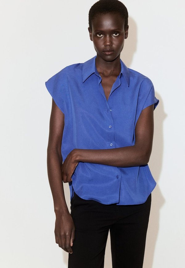 Mango ADULT - Button-down blouse - blue