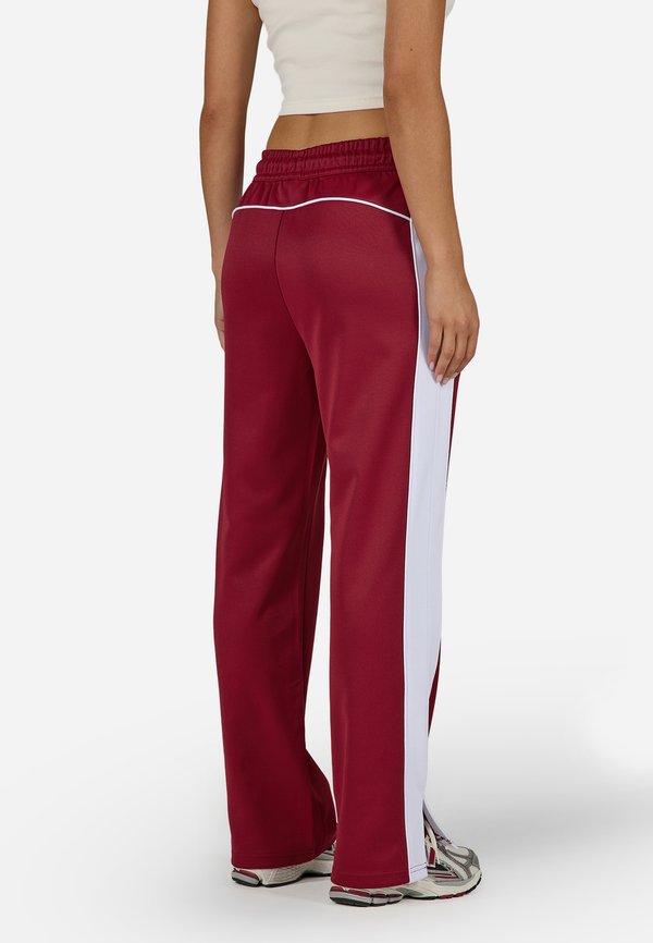 Pegador MARTERA TRACK PANTS