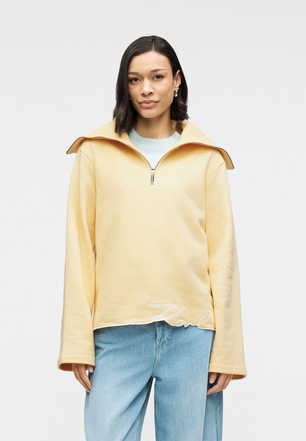 KARL LAGERFELD SIGNATURE HEM HALF ZIP UP