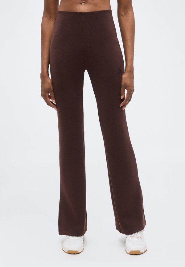 adidas Sportswear SOFT LUX FLARED PANTS - Tracksuit bottoms - shadow brown