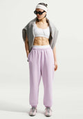 Nike Sportswear STUDIO FLEECE MEDIUM WEIGHT HIGH-RISE OVERSIZED CUFFED PANTS - Tracksuit bottoms - bleached lilac/sail