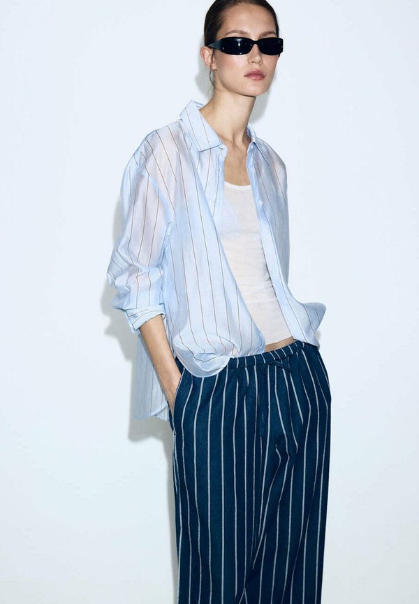 Mango ADULT - Trousers - bleu