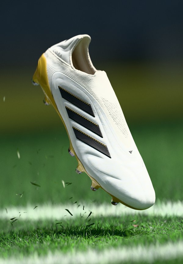 adidas Performance COPA PURE III ELITE LACELESS FIRM GROUND FOOTBALL BOOTS - Firm-ground football boots - metallic/core black/gold metallic