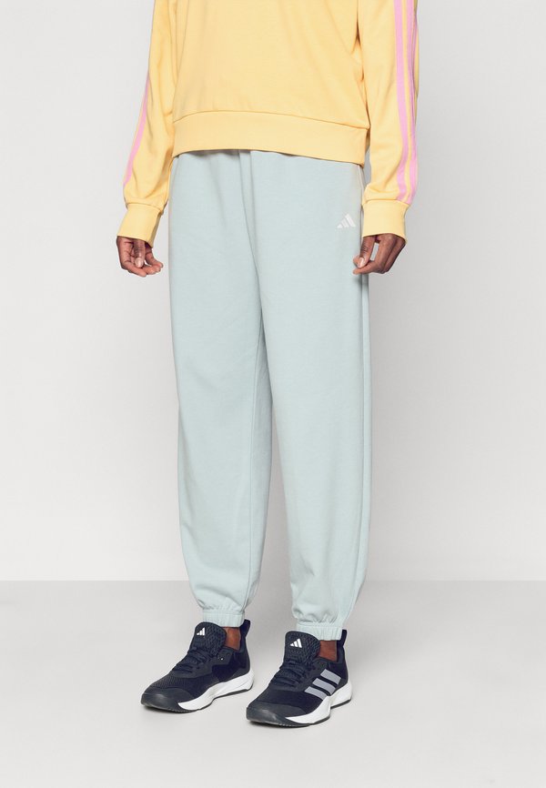 adidas Sportswear ESSENTIALS SMALL LOGO CUFFED PANTS - Tracksuit bottoms - sage/white