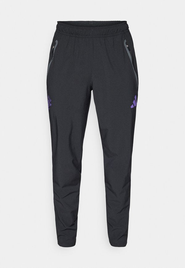 adidas Performance MANCHESTER UNITED TIRO25 COMPETITION VIS TECH TRAVEL PANT - Club wear - black/purple rush