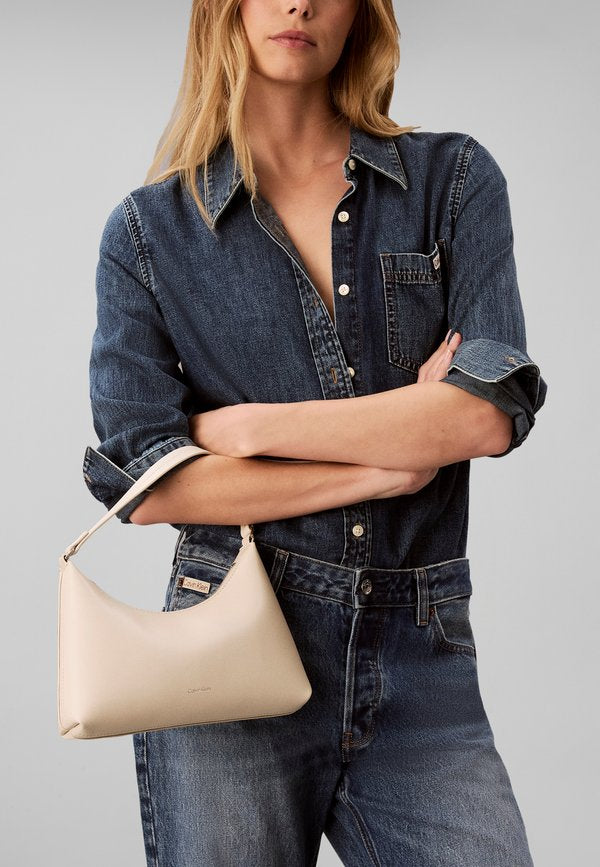 Calvin Klein FOIL LOGO SMALL - Handbag - beige