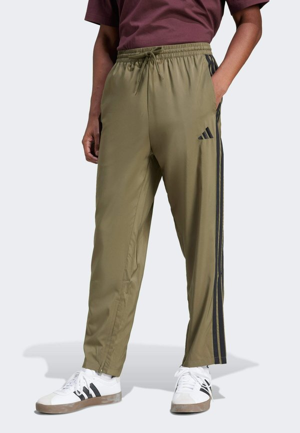 adidas Sportswear M STNFRD OPT 3S - Tracksuit bottoms - olive strata   black