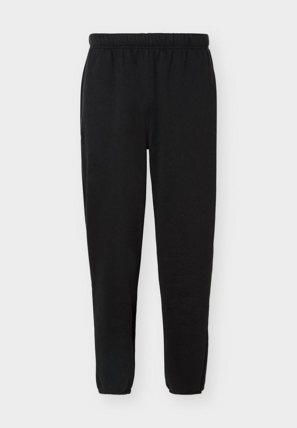 Puma FUNDAMENTALS - Tracksuit bottoms - black