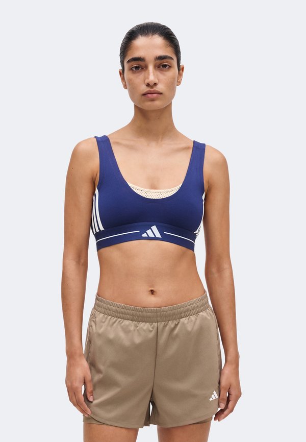 adidas Performance HYG BRALETTE D - Light support sports bra - dark blue