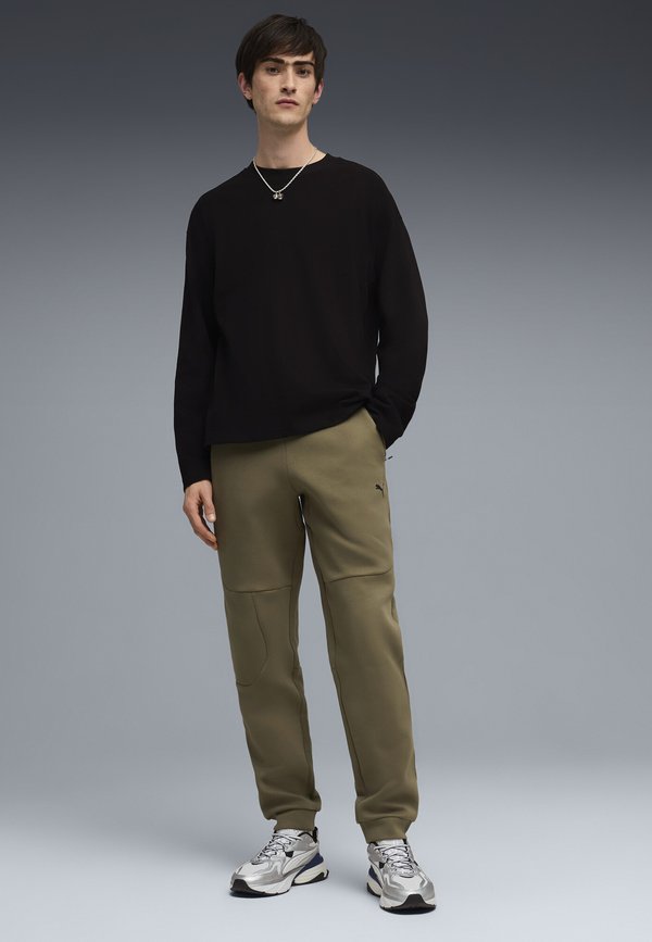 Puma TECH JOGGING - Tracksuit bottoms - loden green