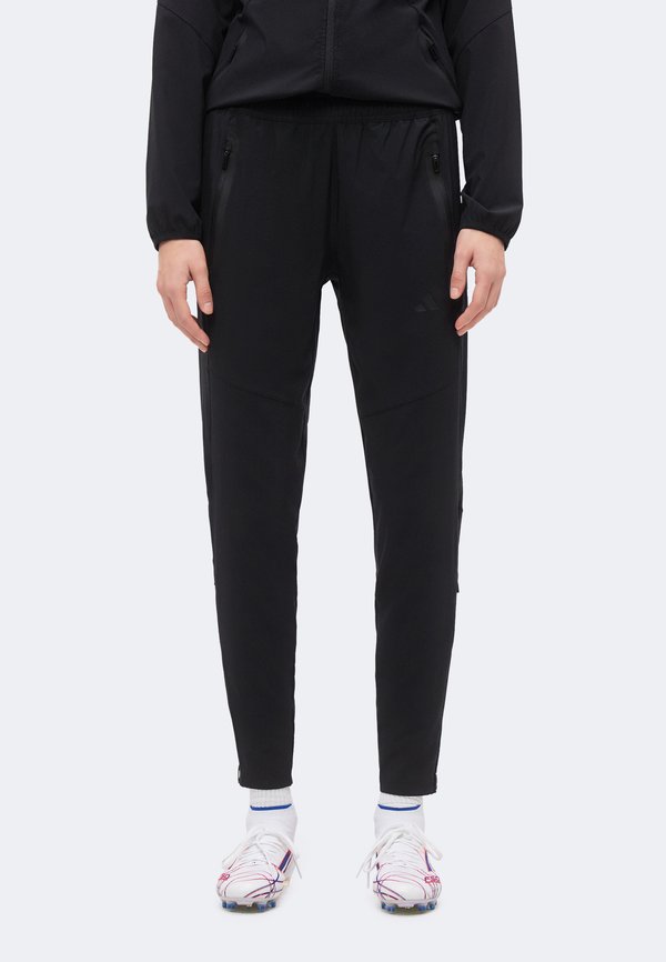 adidas Performance TIRO TRAVEL PANTS - Tracksuit bottoms - black