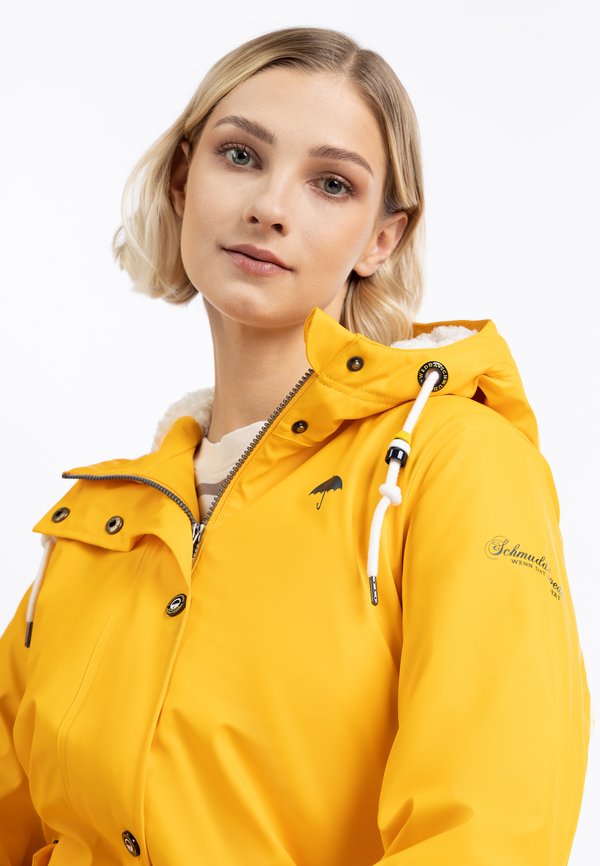 Schmuddelwedda SCHMUDDELWEDDA REGENJACKE MIT WEBPELZFUTTER IN TEDDYOPTIK KILATA