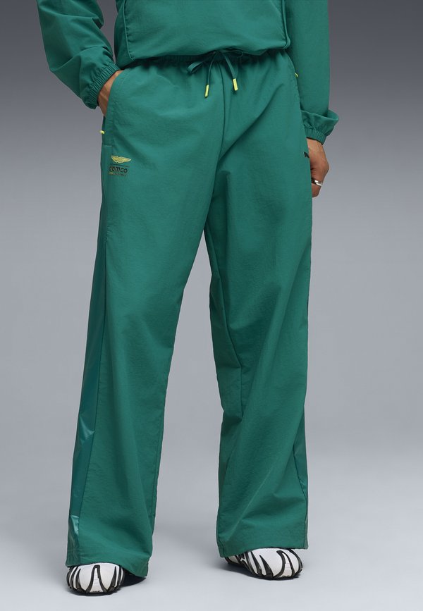 Puma ASTON MARTIN ARAMCO  TEAM LIFESTYLE RELAXED  - Tracksuit bottoms - green lux