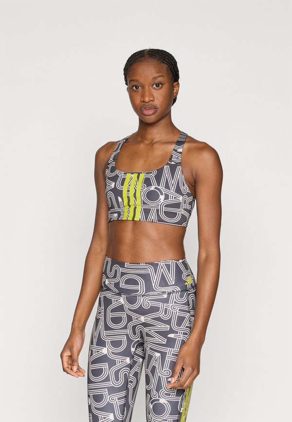 adidas Performance ADIDAS X FARM RIO OPTIME - Medium support sports bra - black/crystal linen/unity lime