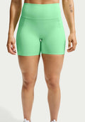 Nike Performance W NK DF UNVRSA HR 5IN SHRT PKT - Leggings - illusion green/light green spark/green spark