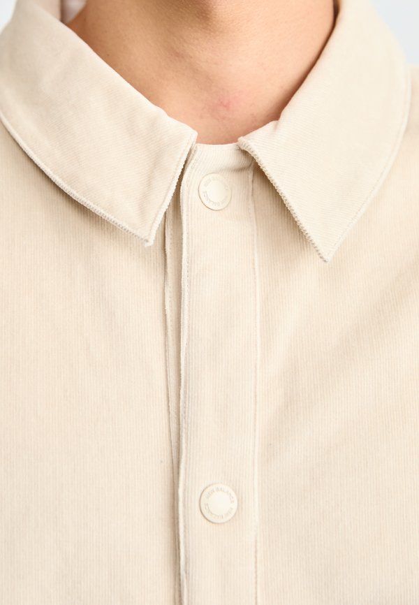 New Balance OVERSHIRT