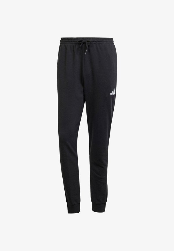 adidas Sportswear ESSENTIALS FEEL COZY - Tracksuit bottoms - black white