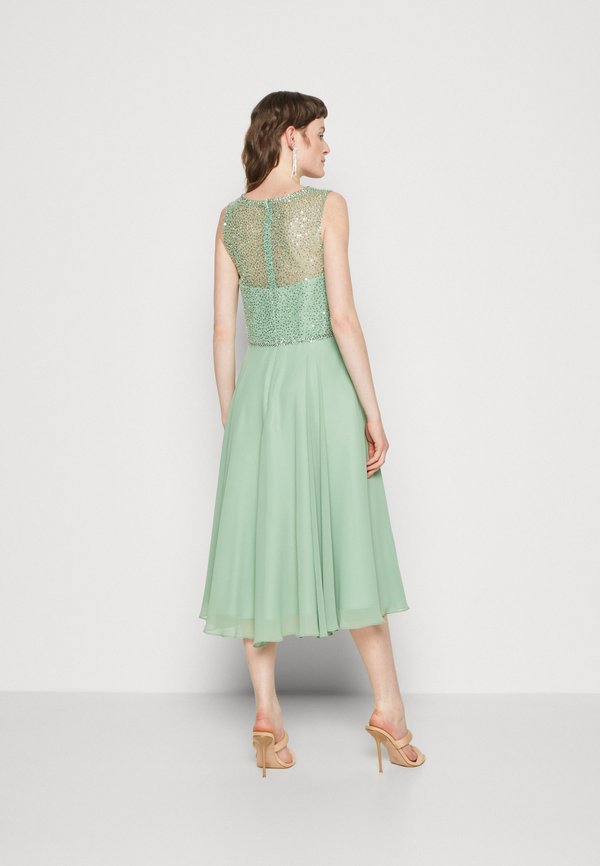 Swing MIDIKLEID AUS PAILLETTE MIT CHIFFON ROCK