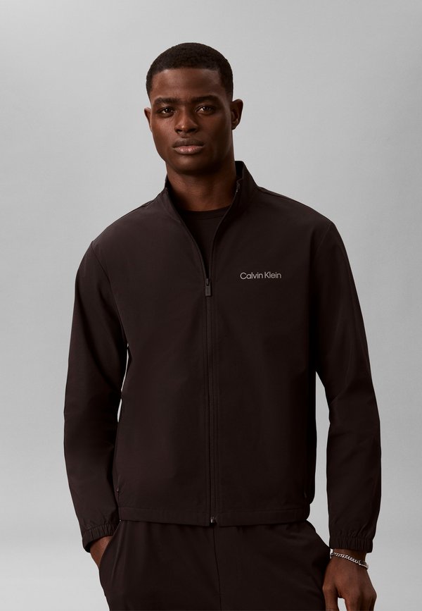Calvin Klein SPORT WIND JACKET - Summer jacket - black