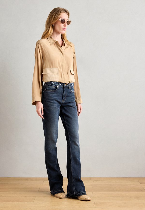 Scotch & Soda THE CHARM