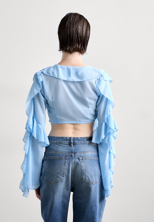 VACLAV RUFFLE BLOUSE