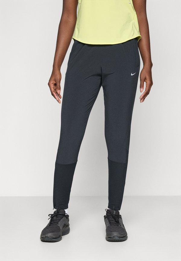 Nike Performance SWIFT - Tracksuit bottoms - black/reflective silver-coloured