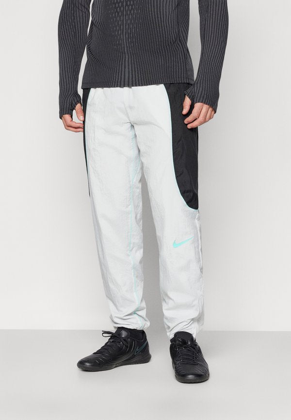 Nike Performance Tracksuit bottoms - photon dust/black/dynamic turq