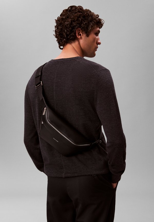 Calvin Klein RAISED LOGO - Bum bag - black