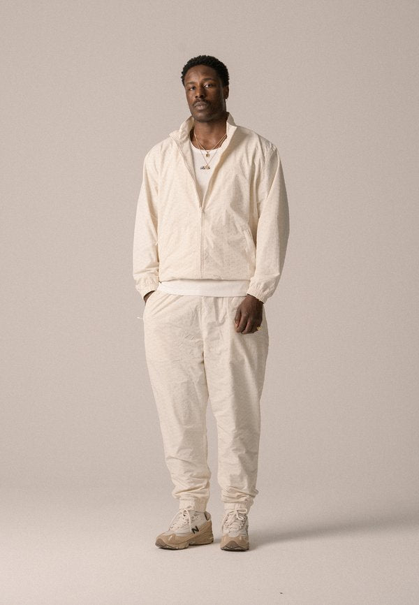 BLKVIS ALLOVER TRACK PANTS UNISEX
