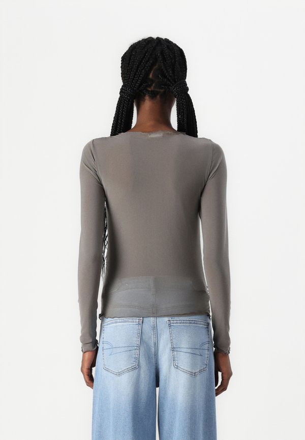 Noisy May NMJUDITH DRAPED