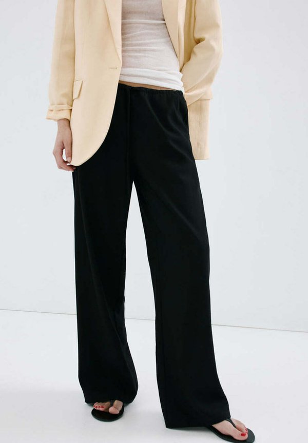 Mango ADULT - Trousers - black