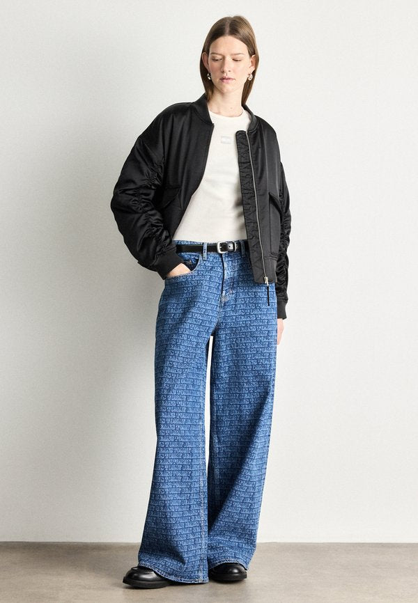 Tommy Jeans SPELL-OUT MID RISE LOOSE JEANS