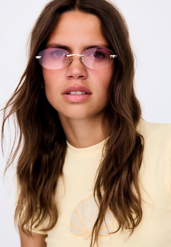 Bershka RIMLESS OVAL - SUNGLASSES - Sunglasses - light pink