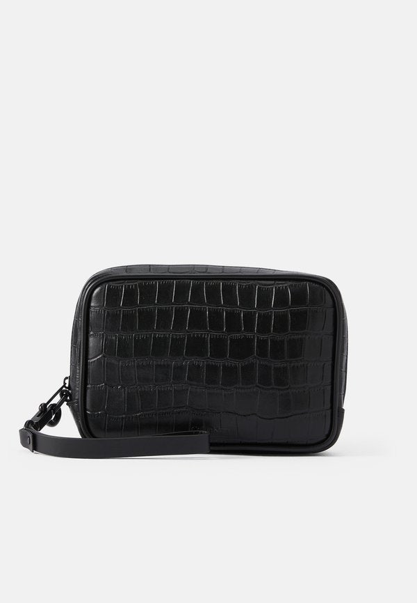 Calvin Klein EMBOSSED WASHBAG HANDLE - Wash bag - black